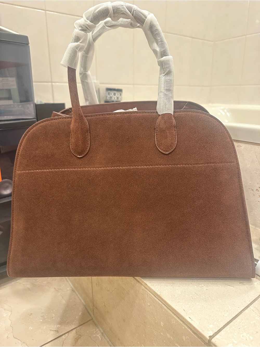 The row handbag suede brown